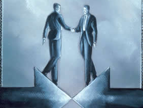 Two businessmen shaking hands across a gap